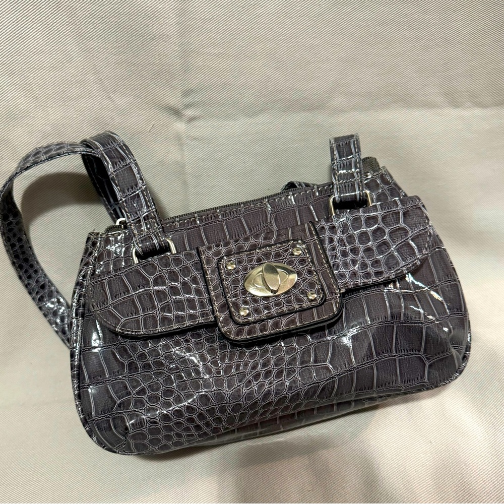 Small shoulder purse. Like new. Faux Alligator material